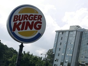 A Burger King logo is pictured outside a restaurant in San Jose, Costa Rica in this October 5, 2015 file photo. (REUTERS/Juan Carlos Ulate)