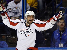 Washington Capitals forward Alex Ovechkin celebrates after scoring his 50th goal of the season in a game against the St. Louis Blues in St. Louis on April 9, 2016. (AP Photo/Jeff Roberson)