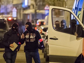 Police investigate an area where terror suspect Mohamed Abrini was arrested in Brussels on April 8, 2016. (AP Photo/Geert Vanden Wijngaert)