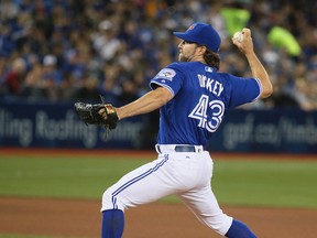 R.A. Dickey of the Toronto Blue Jays pitches against the Boston Red Sox at the Rogers Centre in Toronto on Saturday, April 9, 2016. (Veronica Henri/Toronto Sun)