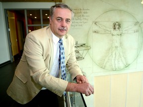 Karl Pfister, president and chief executive of Armatec Survivability, stands by the Leonardo da Vinci mural at his Dorchester plant. Pfister?s lifelong love of air flight inspired him to become both a pilot and an aeronautic engineer. Today, his company produces an armour system that better protects military vehicles and has grown from 20 employees to 200. (MORRIS LAMONT, The London Free Press)