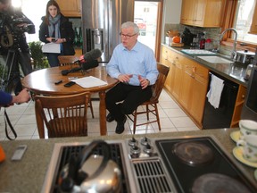 Manitoba NDP leader Greg Selinger makes his 2014 tax return public during a press conference in his kitchen in Winnipeg, Man. Sunday, April 10, 2016. (Brian Donogh/Winnipeg Sun/Postmedia Network)