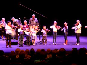 The GPRC Spring Ensemble performs Twinkle, Twinkle Little Star during the 29th Annual Fiddlers Jamboree at the Douglas J Cardinal Performing Arts Centre at Grande Prairie Regional College on Sunday April 10, 2016 in Grande Prairie, Alta. The event brought out more than a dozen acts and event dancers from the Knock School of Irish Dance that got the audience tapping their toes, clapping their hands and humming along to the catchy tunes. Jocelyn Turner/Grande Prairie Daily Herald-Tribune/Postmedia Network