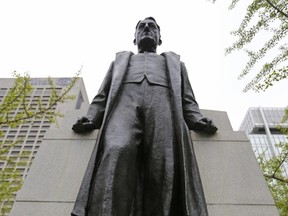 Sir Adam Beck, considered the father of public power ownership in Ontario, is immortalized in this imposing statue in downtown Toronto. Postmedia Network