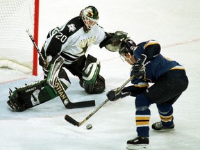Terry Yake (right) in a game from 1999. (REUTERS FILES)