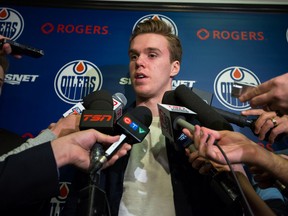 Connor McDavid speaks to media during the Oilers locker-cleanout day Sunday at Rexall Place.(Topher Seguin)