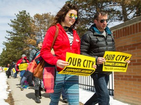 People gathered to walk on Jasmine Cres. in the city's east end in support of their community that has been struck by violence in the last few months Sunday April 10, 2016. (Darren Brown/Postmedia Network).