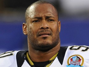 In this Dec. 9, 2012, file photo, New Orleans Saints defensive end Will Smith appears before an NFL football game against the New York Giants in East Rutherford, N.J. Smith was fatally shot after a traffic accident in New Orleans. (AP Photo/Bill Kostroun, File)