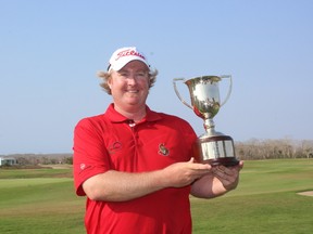 Manotick's Brad Fritsch holds the trophy after winning the Servientrega Championship in Colombia. (PGA Tour)