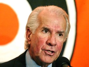 In this Feb. 16, 2004, file photo, Philadelphia Flyers' owner Ed Snider responds to a question during a news conference in Philadelphia. Snider died at the age of 83 on Monday, April 11, 2016 after a two-year battle with cancer. (AP Photo/George Widman, File)