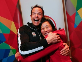 Team Canada Chef de Mission Jean-Luc Brassard announces Carol Huynh as Assistant Chef de Mission at the Toronto Hilton on Dec. 8, 2015. (Stan Behal/Toronto Sun/Postmedia Network)