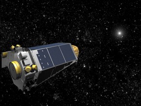 An undated file artists concept provided by NASA shows the Kepler Spacecraft moving through space. The spacecraft, responsible for detecting thousands of planets beyond our solar system, slipped into emergency mode last week nearly 75 million miles from Earth. Ground controllers managed to stabilize the probe Sunday, April 10, 2016, and NASA announced the good news Monday.  (AP Photo/NASA, File)
