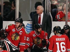 Head coach Joel Quenneville of the Chicago Blackhawks looks on from the bench against the Tampa Bay Lightning during Game 6 of the Stanley Cup Final at the United Center in Chicago on June 15, 2015. (Jonathan Daniel/Getty Images/AFP)