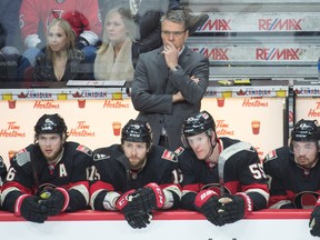 Ottawa Senators head coach Dave Cameron follows third-period NHL action against the Florida Panthers at the Canadian Tire Centre in Ottawa on April 7, 2016. (Marc DesRosiers/USA TODAY Sports)