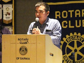 Rafael Tejada, mayor of Tejutla in El Salvador, speaks at a Sarnia Rotary Club meeting Monday. It was part of a five-day visit to Sarnia-Lambton, wrapping up Wednesday. Also pictured is Delores Quintanilla. (Tyler Kula, The Observer)
