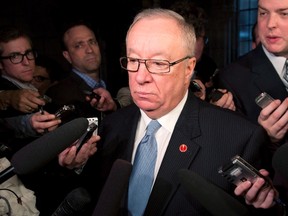 Former NHL coach (and current senator) Jacques Demers is shown speaking to the media following a caucus meeting on Parliament Hill Tuesday, May 21, 2013 in Ottawa. (THE CANADIAN PRESS/Adrian Wyld)