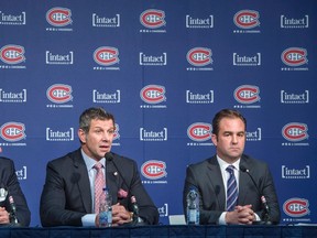 Montreal Canadiens general manager Marc Bergevin, centre, responds to a question next to head coach Michel Therrien, left, and owner Geoff Molson during a news conference Monday, April 11, 2016 in Brossard, Que. (THE CANADIAN PRESS/Paul Chiasson)
