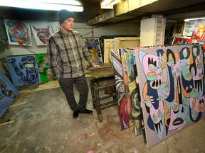 Artist Ryan Machan works in his Adelaide Street studio, which will be part of this year?s London Artists? Studio tour. (MORRIS LAMONT, The London Free Press)