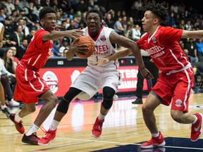 Team White’s Godwin Boahen goes to the hoop at the Bio-Steel All-Canadian Basketball game at U of T last night. Jahvon Blair of Team White led all scores with 31 points in a 120-118 win. O’Shae Brissett and Kalif Young had 20 points for Team Red. (Craig Robertson/Toronto Sun)