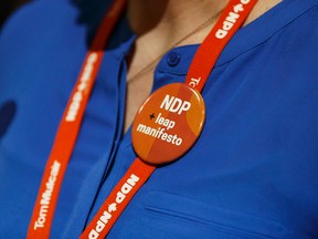 Former MP Megan Leslie speaks, wearing a supportive button, for the Leap Manifesto during the Edmonton 2016 NDP national convention at Shaw Conference Centre in Edmonton, Alta., on Sunday April 10, 2016. The climate change manifesto passed. Photo by Ian Kucerak