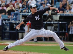 In this March 5, 2016, file photo, New York Yankees relief pitcher Nick Rumbelow delivers to the Boston Red Sox during a spring training baseball game in Tampa, Fla. (AP Photo/Chris O'Meara)