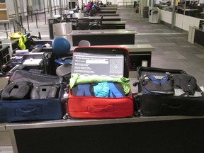 Unclaimed luggage containing 90.45 kilograms of suspected cocaine found at the Pearson International Airport. (Canadian Border Services Agency handout photo)