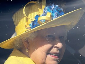 Britain's Queen Elizabeth II leaves in a car after attending the Easter Mattins service at St. George's Chapel, at Windsor Castle in England, Sunday, March 27, 2016. (AP Photo/Kirsty Wigglesworth, pool)