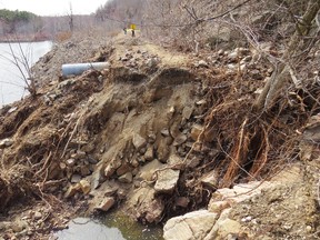 A section of the Cataraqui Trail near Chaffey’s Lock was washed out by water released by a broken beaver dam on the weekend. (Steve Manders/For The Whig-Standard)