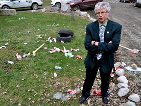 Jay Stanford, the City of London’s director of environment, fleet, and solid waste, stands next to litter after launching the 21st annual London Clean and Green program in London Ont. April 12, 2016. CHRIS MONTANINI\LONDONER\POSTMEDIA NETWORK