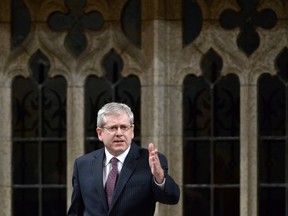 NDP MP Charlie Angus takes part in an emergency debate on the suicide crisis on Aboriginal reserves, particularly in Attawapiskat in Ontario, in the House of Commons in Ottawa, Tuesday, April 12, 2016. THE CANADIAN PRESS/Adrian Wyld
