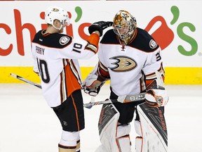 Anaheim Ducks goalie Frederik Andersen (31) celebrates with Ducks right wing Corey Perry (10) after their game against the Washington Capitals at Verizon Center. The Ducks won 2-0.