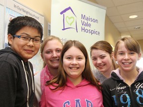 In this file photo, Churchill Public School students Kyle Fong, left, Hannah Ethier, Arianna Radey, Amy Vincent and Emma Risto take part in the launch of the 2013 RBC Hike for Hospice at the RBC Royal Bank on Lasalle Boulevard in Sudbury. John Lappa/Sudbury Star