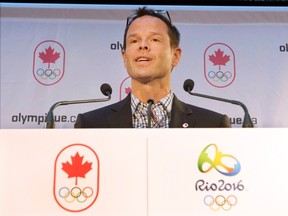 Jean-Luc Brassard speaks to the media after being named Canada's chef de Mission for the 2016 Olympics in Montreal on Dec. 4, 2014. (THE CANADIAN PRESS/Ryan Remiorz)