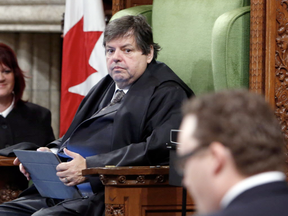 Liberal MP Mauril Belanger sits in the Speaker's Chair to preside over the House of Commons Wednesday, serving as honorary Speaker, in a tribute organized by his fellow MPs following his diagnosis with ALS last November, in Ottawa Wednesday March 9, 2016. THE CANADIAN PRESS/Fred Chartrand
