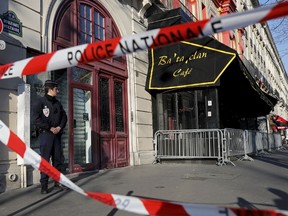 French police block the access to the Bataclan concert hall before the visit of members of a committee investigating government measures to fight shooting and bombing attacks at the site four months after a series of attacks at several sites in Paris, France, March 17, 2016. REUTERS/Benoit Tessier