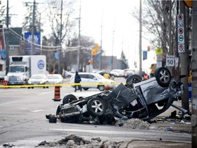 Ottawa Police and the Special Investigations Unit were at the corner of Vanier Parkway and McArthur Avenue investigating an over night car accident Tuesday April 12, 2016. ASHLEY FRASER
