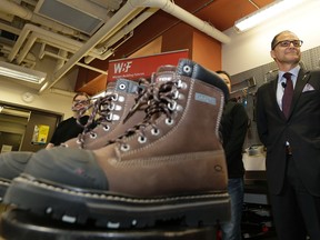 Joe Ceci, Alberta Minister of Finance & President of the Treasury Board, displayed his 2016 Budget boots in Edmonton on April 13, 2016. The Alberta government will be releasing the provincial budget tomorrow (Thursday April 14, 2016). (PHOTO BY LARRY WONG/POSTMEDIA NETWORK