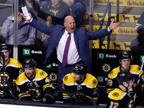 Boston Bruins head coach Claude Julien complains to officials after a call during third-period action against the Florida Panthers at TD Garden in Boston on March 24, 2016. (AP Photo/Elise Amendola)