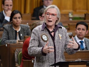 Carolyn Bennett, minister of Indigenous and Northern Affairs Canada, takes part in an emergency debate on the suicide crisis on Aboriginal reserves, particularly in Attawapiskat in Ontario, in the House of Commons in Ottawa, Tuesday, April 12, 2016. THE CANADIAN PRESS/Adrian Wyld