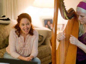 Vocalist Tracey Atin and harpist Mary Ashton rehearse for the Light of the East Ensemble?s album launch Saturday at Aeolian Hall. (MIKE HENSEN, The London Free Press)