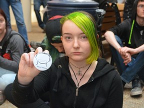 Arthur Voaden Secondary School student Grace Cassis took a vow of silence Wednesday to stand up against homophobia. The Grade 10 student was one of 160 at the school who participated in the third annual Day of Silence.