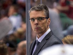 Ottawa Senators head coach Dave Cameron watches his team in the third period against the Minnesota Wild in Minneapolis, in this file photo taken March 31, 2016. (Brad Rempel/USA TODAY Sports)