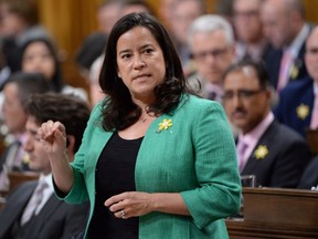 Justice Minister Jody Wilson-Raybould answers a question during Question Period in the House of Commons in Ottawa, on April 13, 2016. More than a year after the Supreme Court struck down Canada's ban on assisted suicide, the federal government introduced a new law spelling out the conditions in which seriously ill or dying Canadians may seek medical help to end their lives. (THE CANADIAN PRESS/Adrian Wyld)