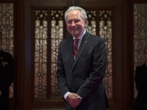 Senator Peter Harder waits to take his place in the Senate before being officially welcomed to the Senate on Parliament Hill in Ottawa, Tuesday April 12, 2016. THE CANADIAN PRESS/Adrian Wyld