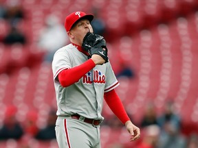 In this April 7, 2016 file photo, Philadelphia Phillies relief pitcher Daniel Stumpf walks to the dugout after being pulled from the game during the fourth inning of a baseball game against the Cincinnati Reds, in Cincinnati. (AP Photo/Gary Landers, File)