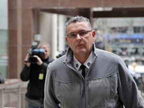 Supt. David (Mark) Fenton is seen outside police headquarters in Toronto on Wednesday. Complainants told his misconduct sentencing hearing he should be fired for ordering indiscriminate mass arrests during the tumultuous G20 summit six years ago. (THE CANADIAN PRESS/Colin Perkel)