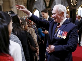 Canada's Governor General David Johnston greets guests in the Hall of Honour before the Speech from the Throne on Parliament Hill in Ottawa, Canada December 4, 2015.    REUTERS/Blair Gable