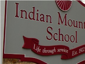 A sign outside Indian Mountain School is pictured in this Wikipedia photo. ( 	Falconfreddie/Wikipedia)