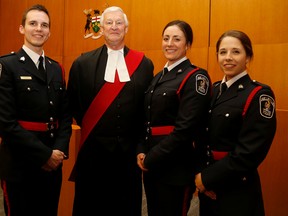 Emily Mountney-Lessard/The Intelligencer
Belleville Police Service welcomed Gregory Kendall, Kelsey Cailes and Rachel Terpstra to the service on Thursday. The three new constables are shown here with Justice Stephen Hunter following their swearing-in ceremony.