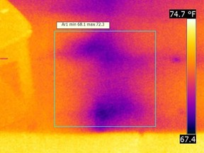 An image from an infrared camera shows water underneath a basement carpet that can?t be seen.